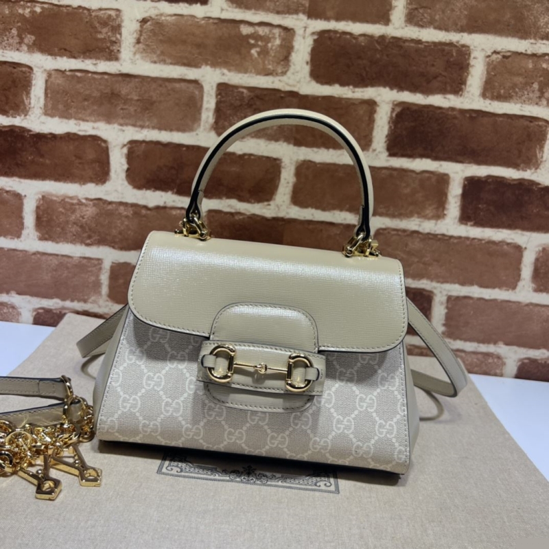 G*u*i top handle bags